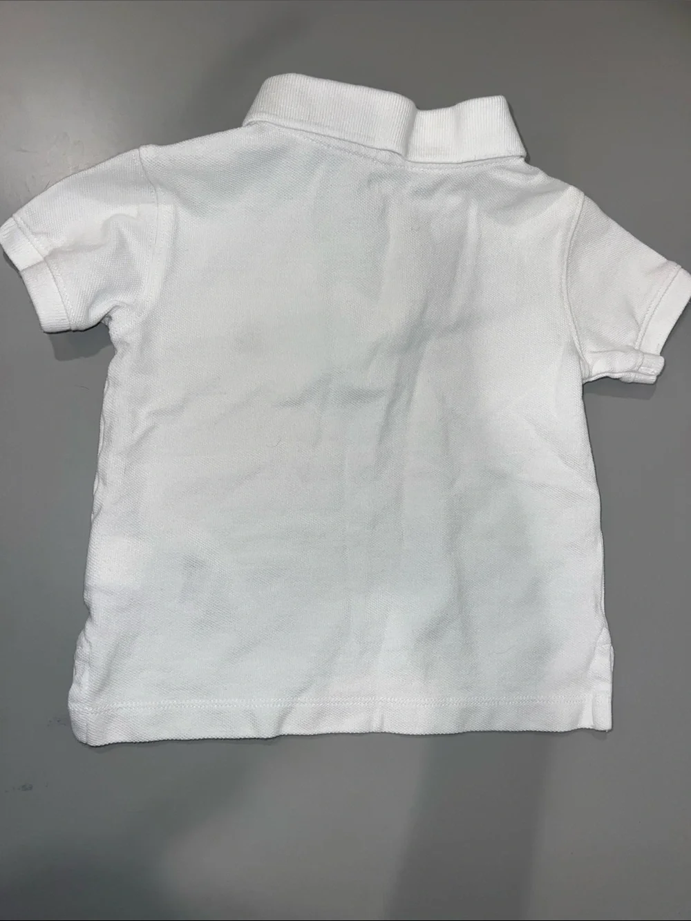 Gap Lot - A collared shirt, onesie, and shorts from Gap